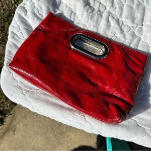 Shiny leather clutch